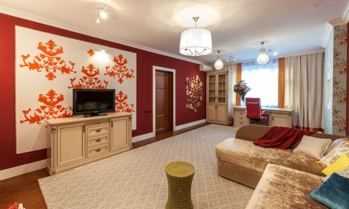 Дизайн стены с телевизором в гостиной и современные тенденции материалов