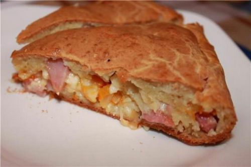 Пирожки из слоеного теста с ветчиной: с сыром и с беконом, фото булочек из дрожжевого теста, рецепт с яйцом